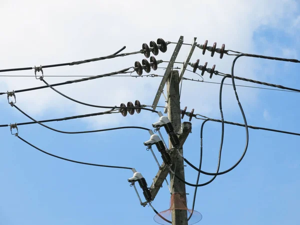 high voltage wires on the sky background