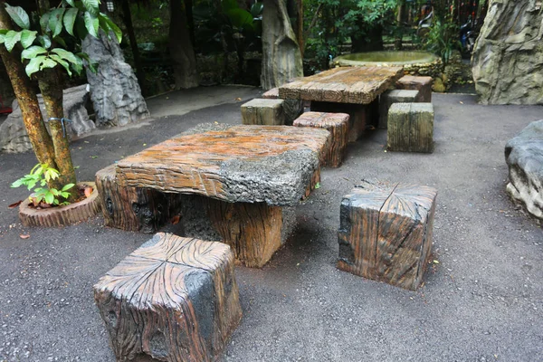 Stone chairs in the garden.