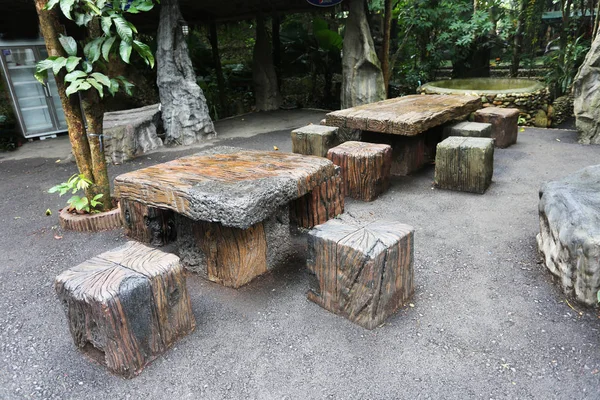 Stone chairs in the garden.