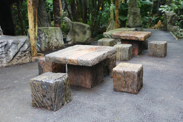 Stone chairs in the garden.