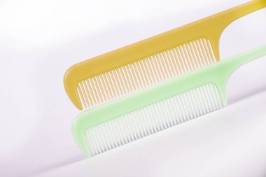 close-up view of combs on white background