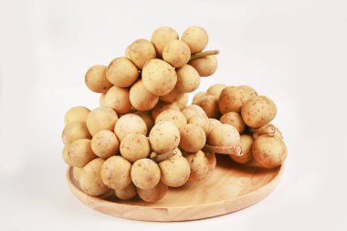 close-up view of Lansium parasiticum or langsat fruits isolated on white background