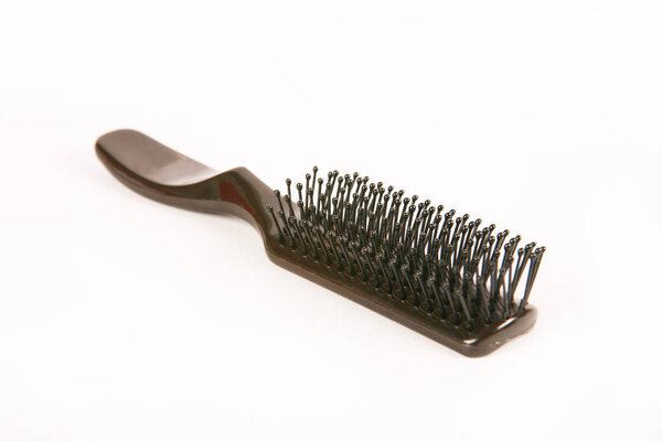 close-up view of comb on white background