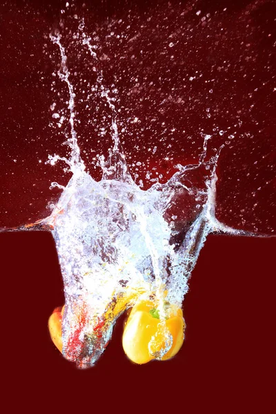 Fresh Vegetables Splashes Red Background — Φωτογραφία Αρχείου