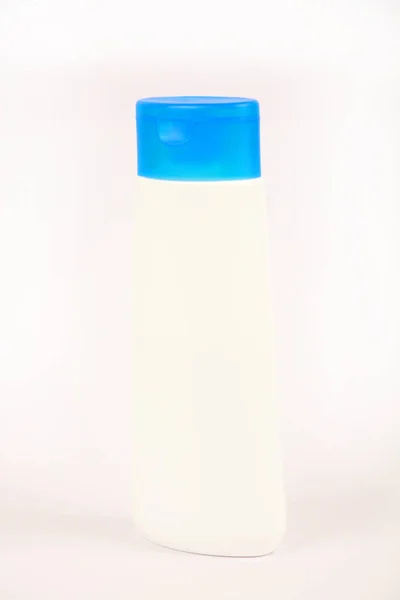 close-up view of cosmetics container on white background