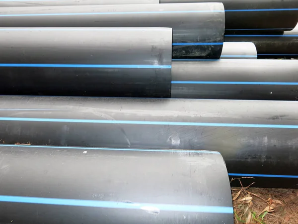 industrial pipes, plastic pvc pipes. construction site.