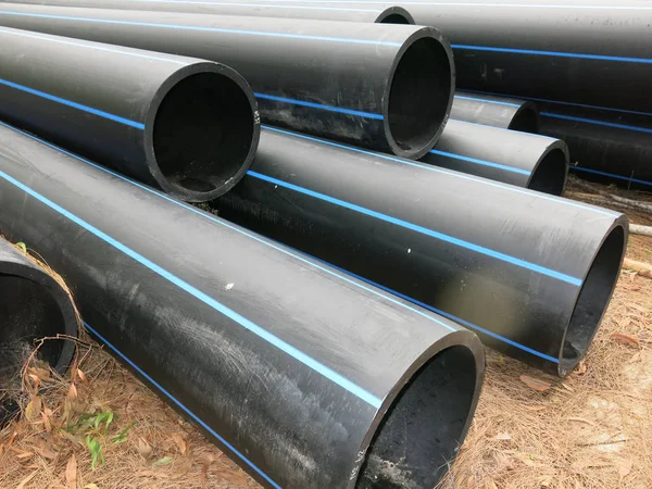 industrial pipes, plastic pvc pipes. construction site.