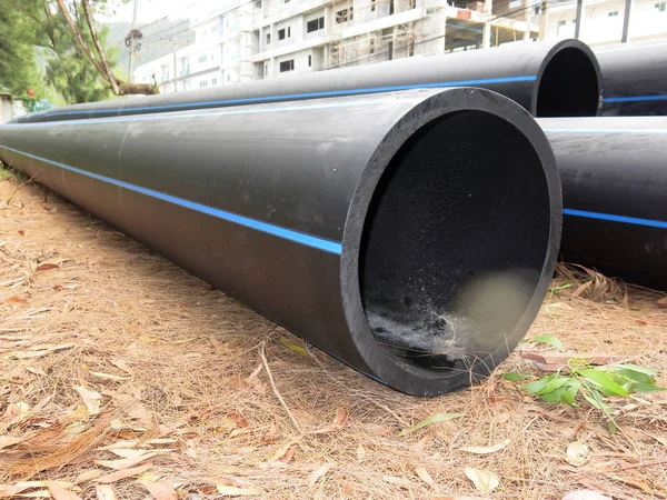 industrial pipes, plastic pvc pipes. construction site.