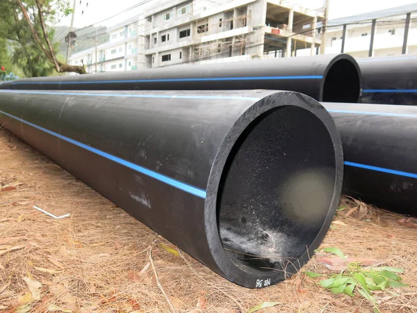 industrial pipes, plastic pvc pipes. construction site.