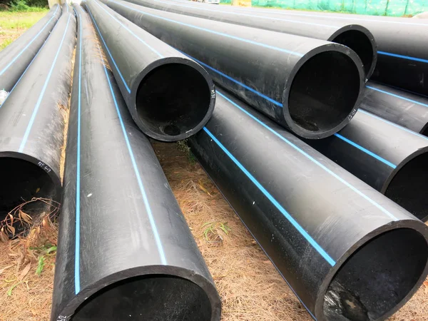 industrial pipes, plastic pvc pipes. construction site.