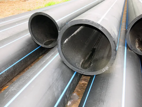 industrial pipes, plastic pvc pipes. construction site.