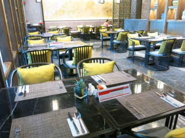 elegant served tables in luxury restaurant interior