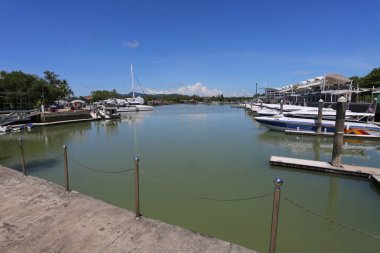 Metal equipment on yachts at pier.