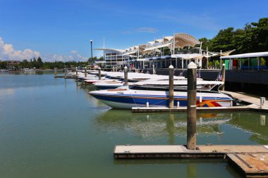 Metal equipment on yachts at pier.
