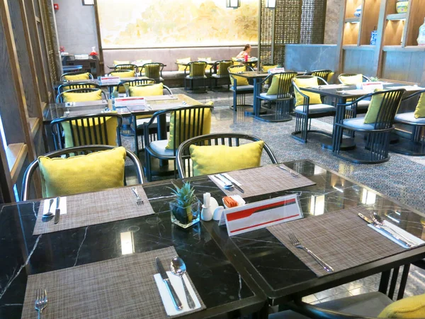 elegant served tables in luxury restaurant interior