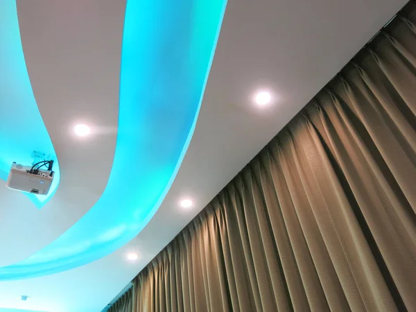 Fabric decoration with ceiling lighting.