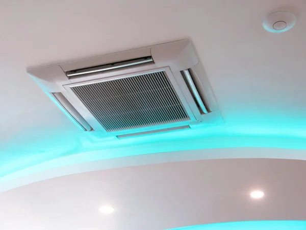 Air conditioner hanging on ceiling in home.