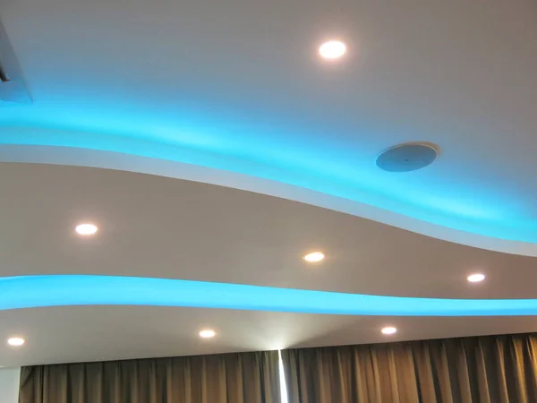 Fabric decoration with ceiling lighting.