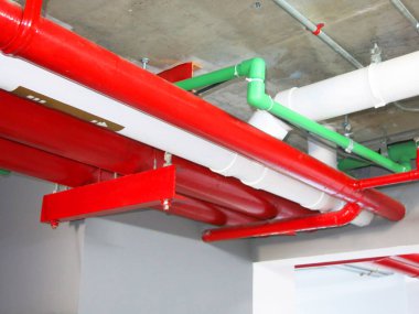 construction site with pipes inside industrial building