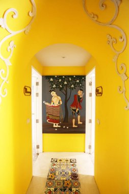 Artwork on wall in thailand temple.