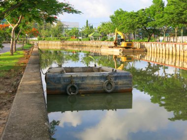 Old tires at the marina on sea background.