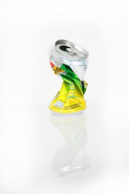 close-up view of used soda can on white background