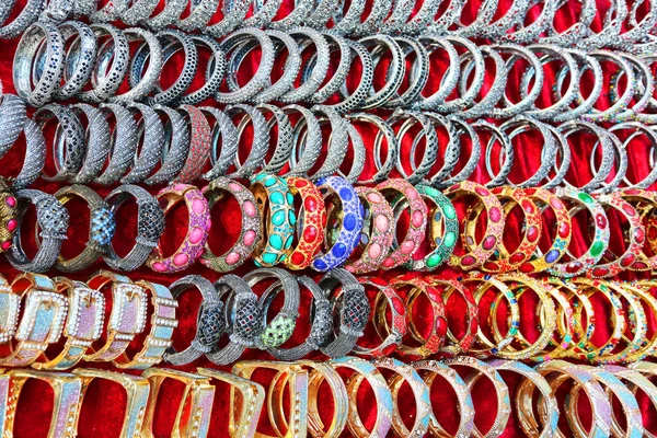 Thai culture souvenirs hanging in shop market.