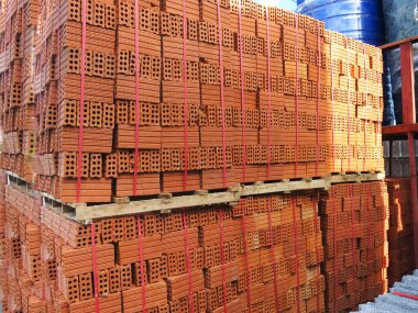 pile concrete boxes on white background. construction site for building, wall and materials