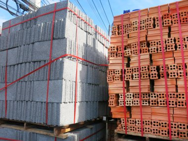 pile concrete boxes on white background. construction site for building, wall and materials