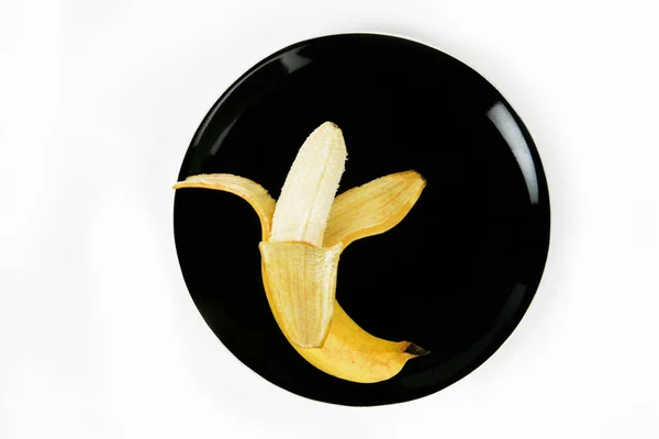 Banana Black Plate White Background — Foto Stock