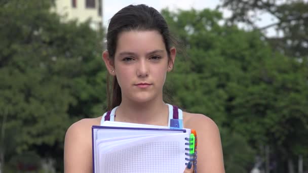 Serious Female Teen Student With Notebook — Stock Video