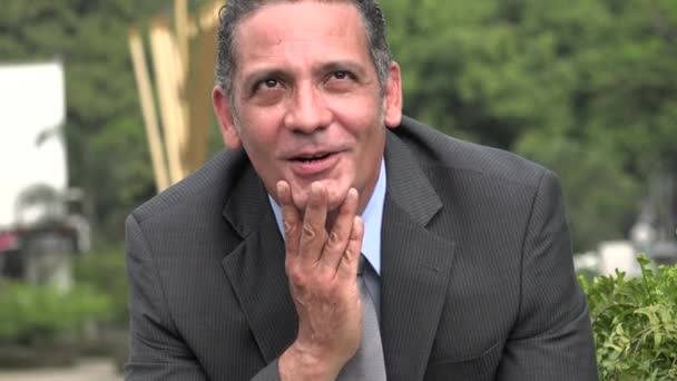 Contemplative Adult Hispanic Businessman — Stock Video