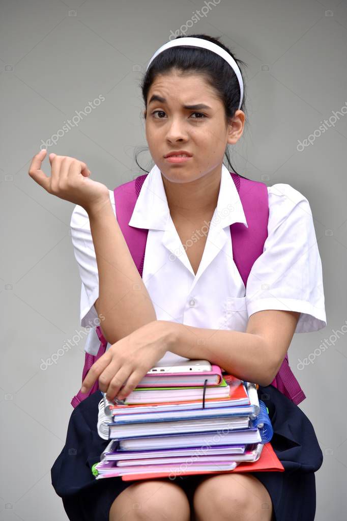 School Girl And Confusion With Notebooks