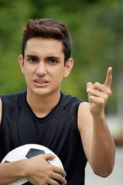 İşaret eden bir futbol oyuncusu