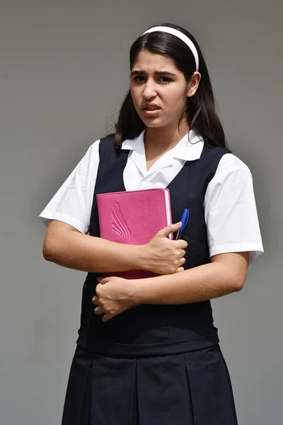 Worried Girl Student With Notebook