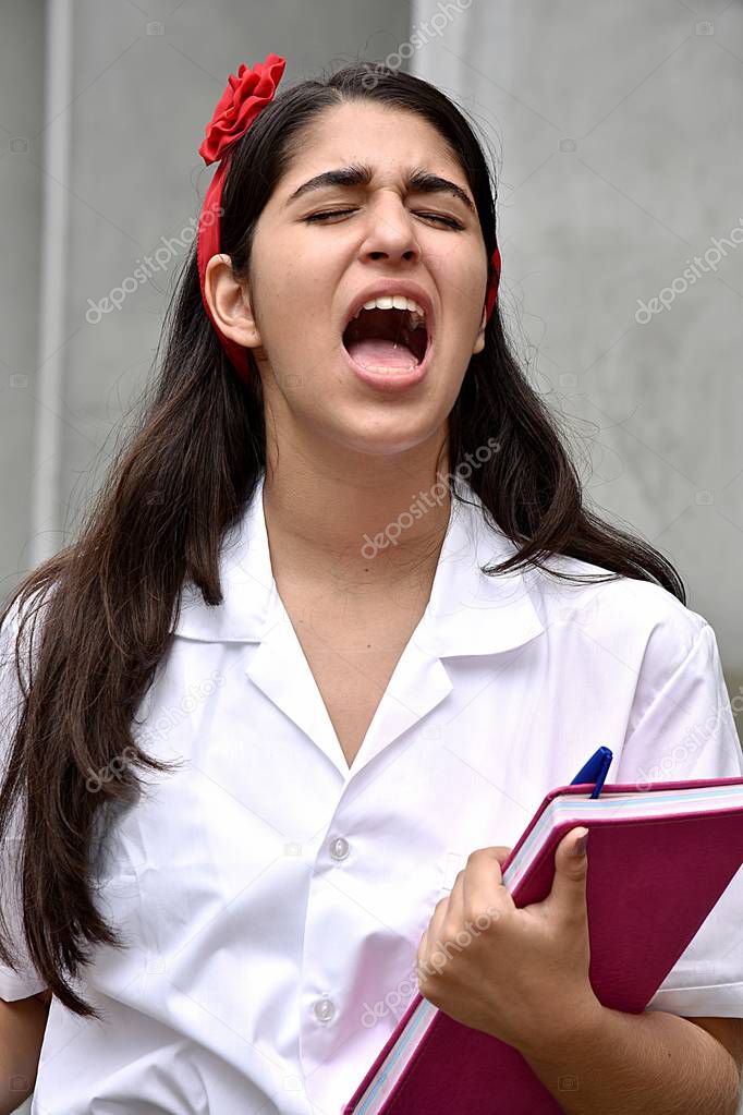 Colombian Girl Student And Anger With Notebook