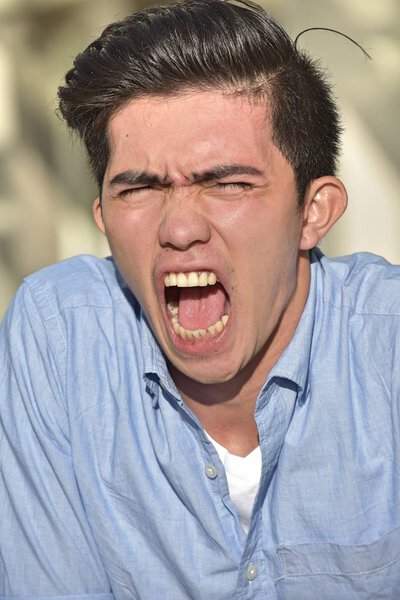 An Asian Male Yelling