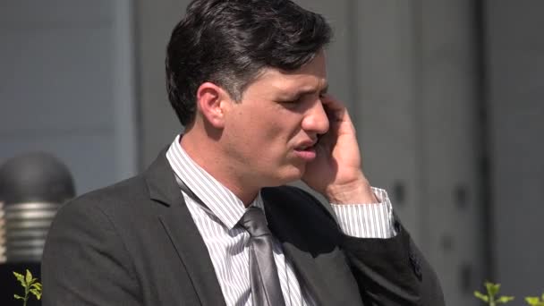 Unhappy Hispanic Business Man Using Phone — Stock Video