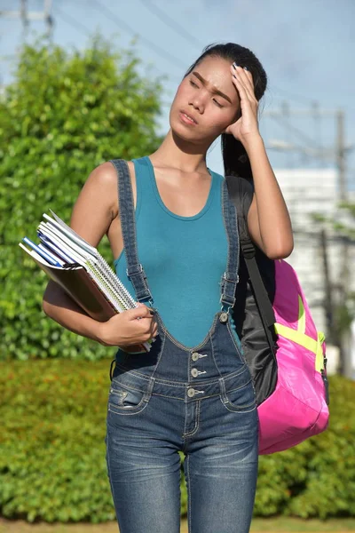 Stressed Minority Girl Student With Notebooks