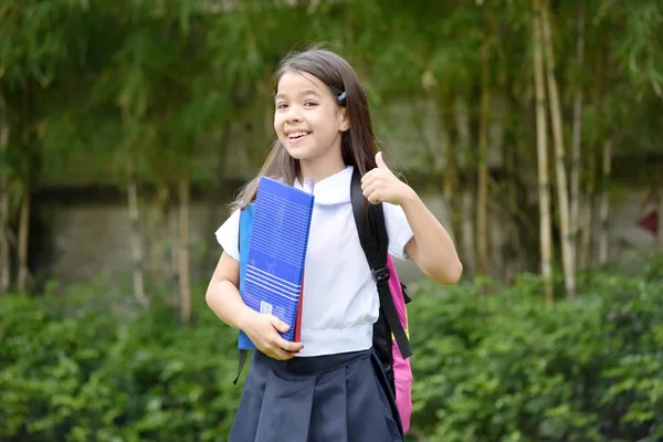 Happy Catholic Minority Female Student Notebooks — Stok Foto