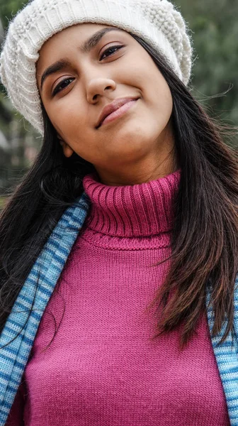 Cute Peruvian Girl With Long Hair Wearing Winter Clothes