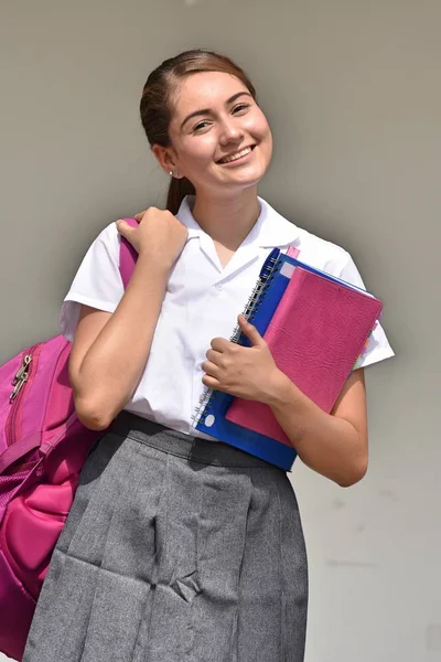 Catholic Colombian Female Student Smiling Wearing Skirt With Books