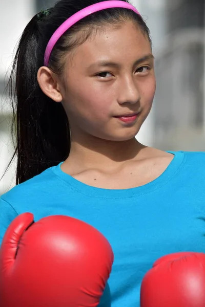 Serious Female Boxer Wearing Boxing Gloves