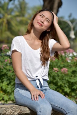 Merak Asyalı bir kadın