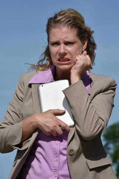 Stressed Business Woman Wearing Suit With Tablet