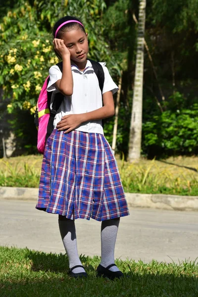 Worried Girl Student Wearing Uniform With Notebooks