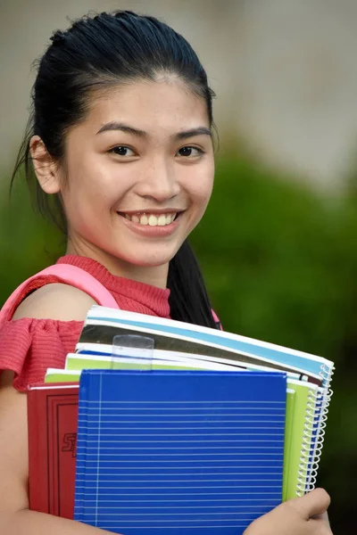 Happy Minority Person With Notebooks