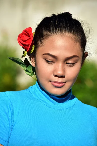 Attractive Diverse Female Portrait With A Rose