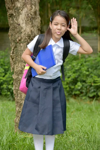 Asian School Girl Making Funny Faces