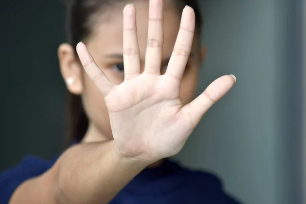 Asian Female Gesturing Stop